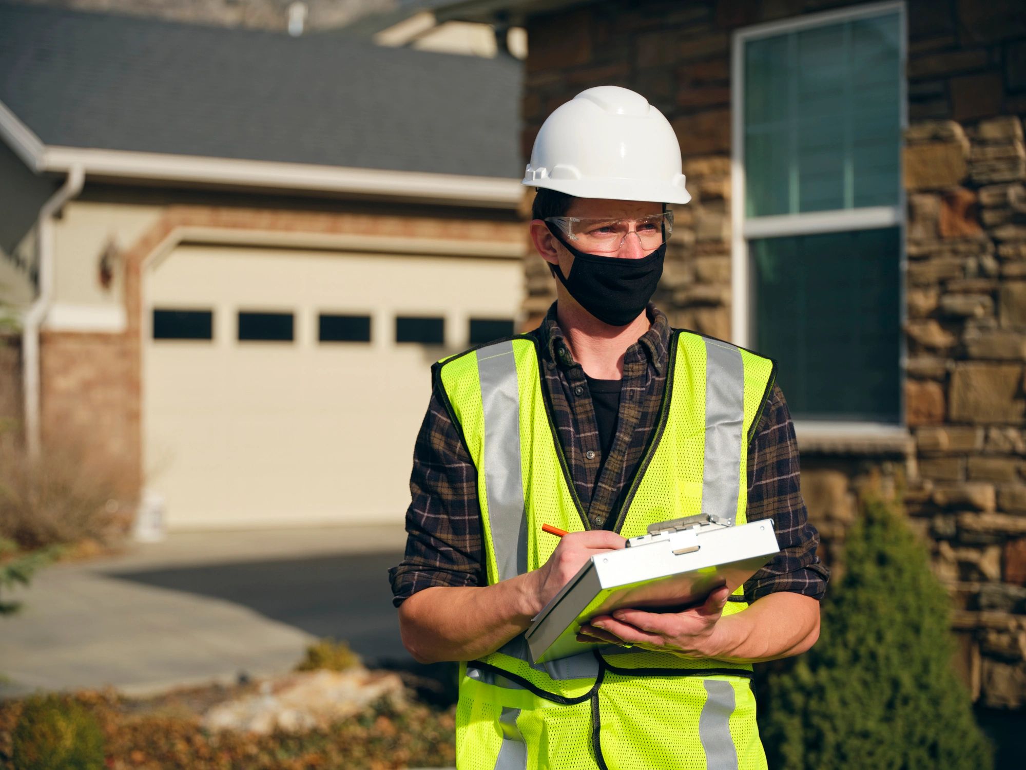 Property maintenance professional working outside a home