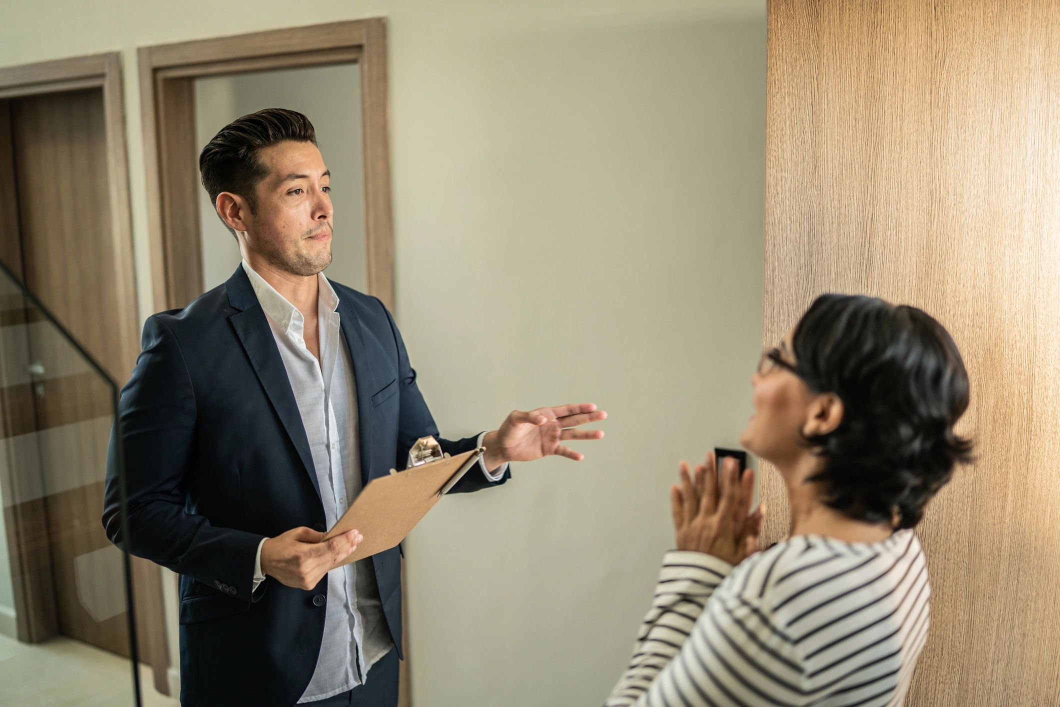 Property manager speaking with residential client